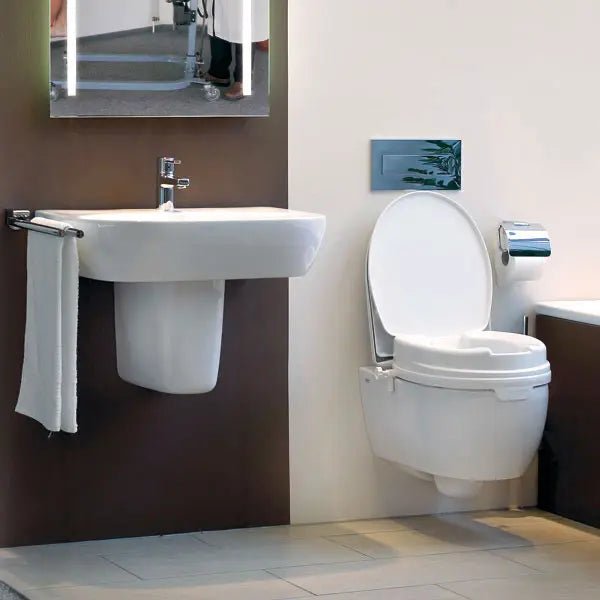 Toilettensitzerhöhung mit Deckel - weiß - Dietz GmbH